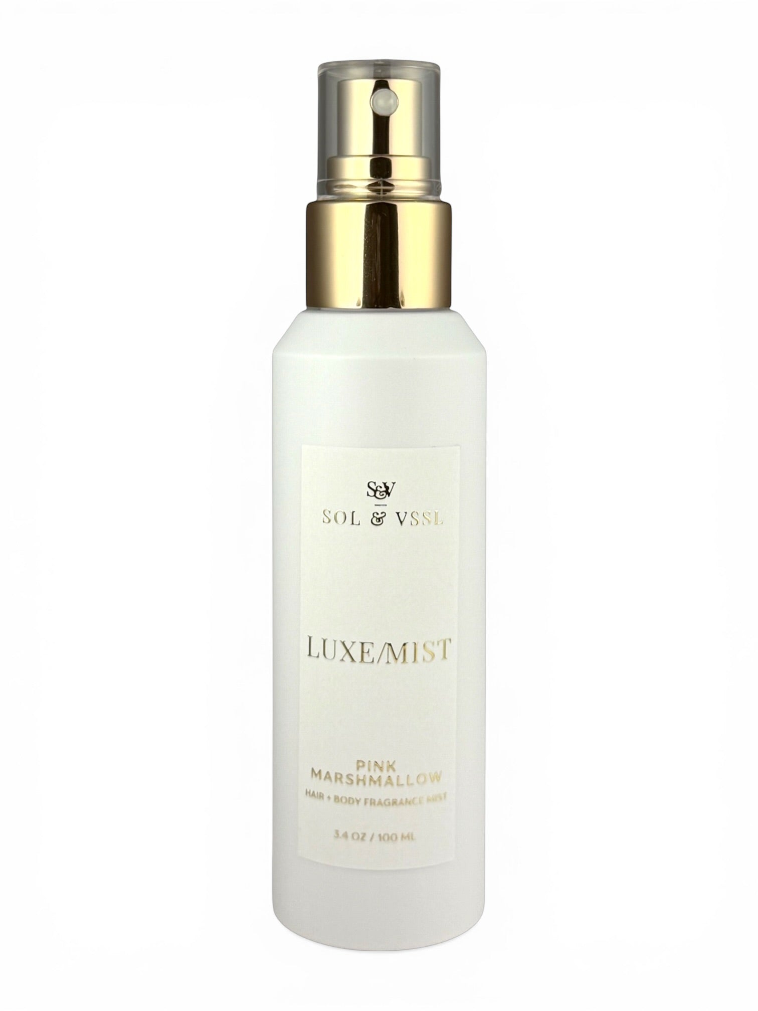 White spray bottle with gold cap labeled 'LUXE MIST' on a white background