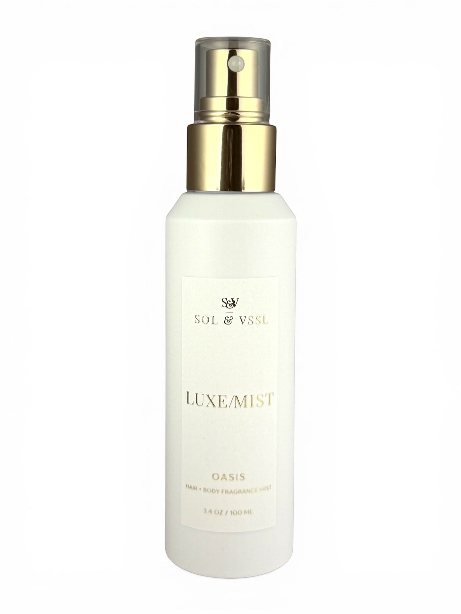 White spray bottle with gold cap labeled 'Luxe Mist' on a white background