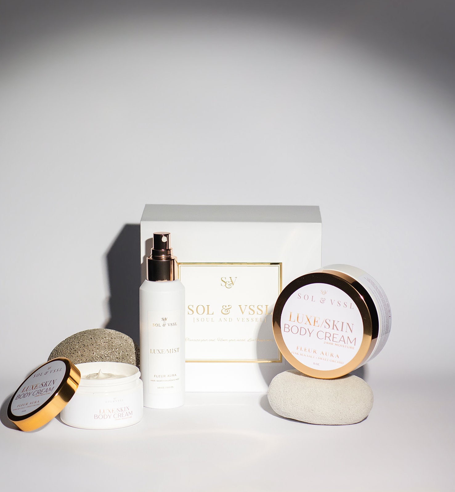 Skincare products including a bottle, jar, and cream on a light gray background with 'SOL & VESS' branding.